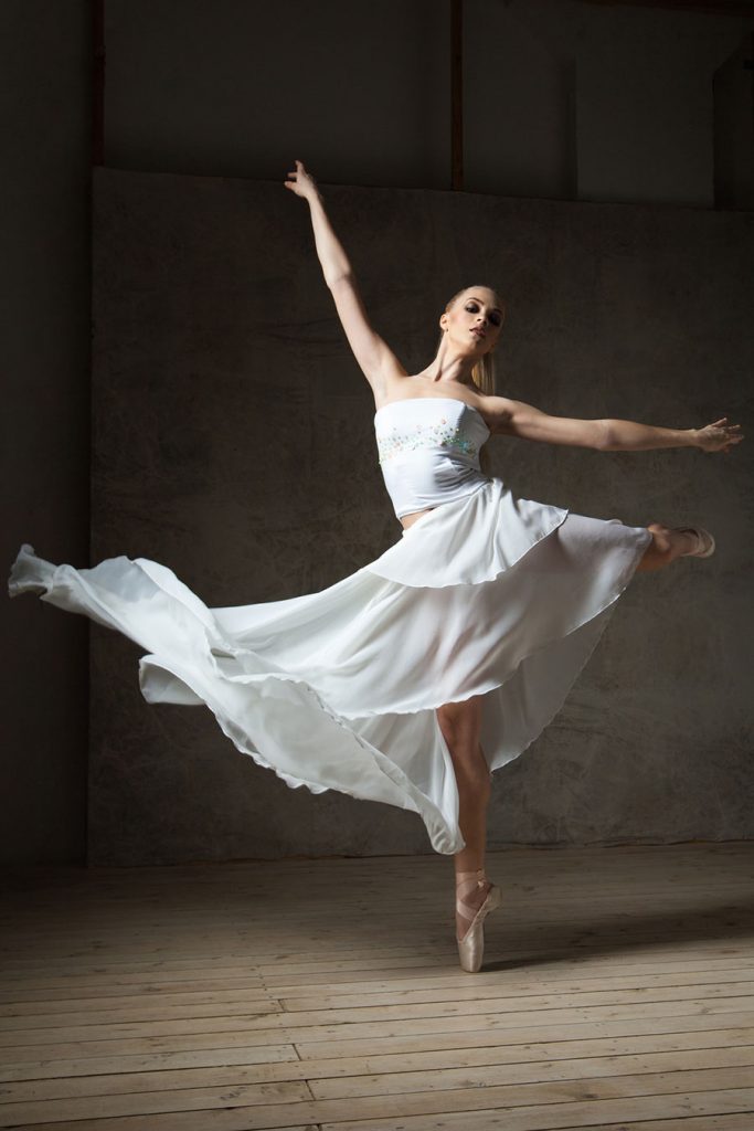 photodune-17229838-beautiful-ballet-dancer-in-white-costume-with-waving-skirt-dancing-m